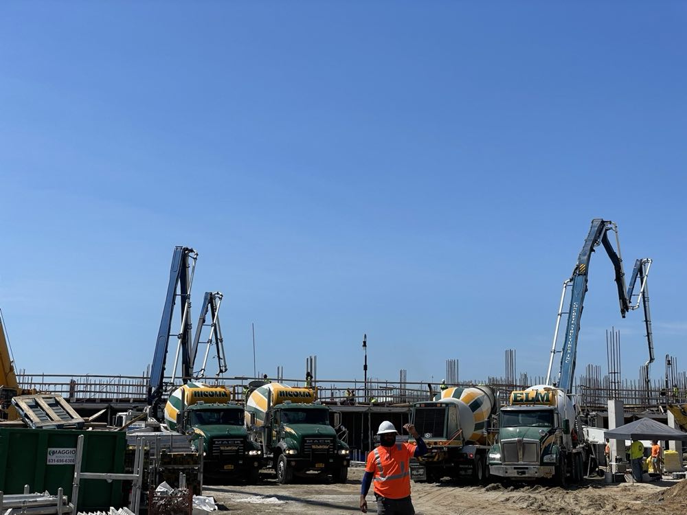 Nicolia crew on site with mixer trucks and concrete pumps