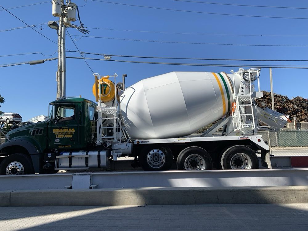 Nicolia Ready-Mix mixer truck 17, green Mack cab with the striped drum