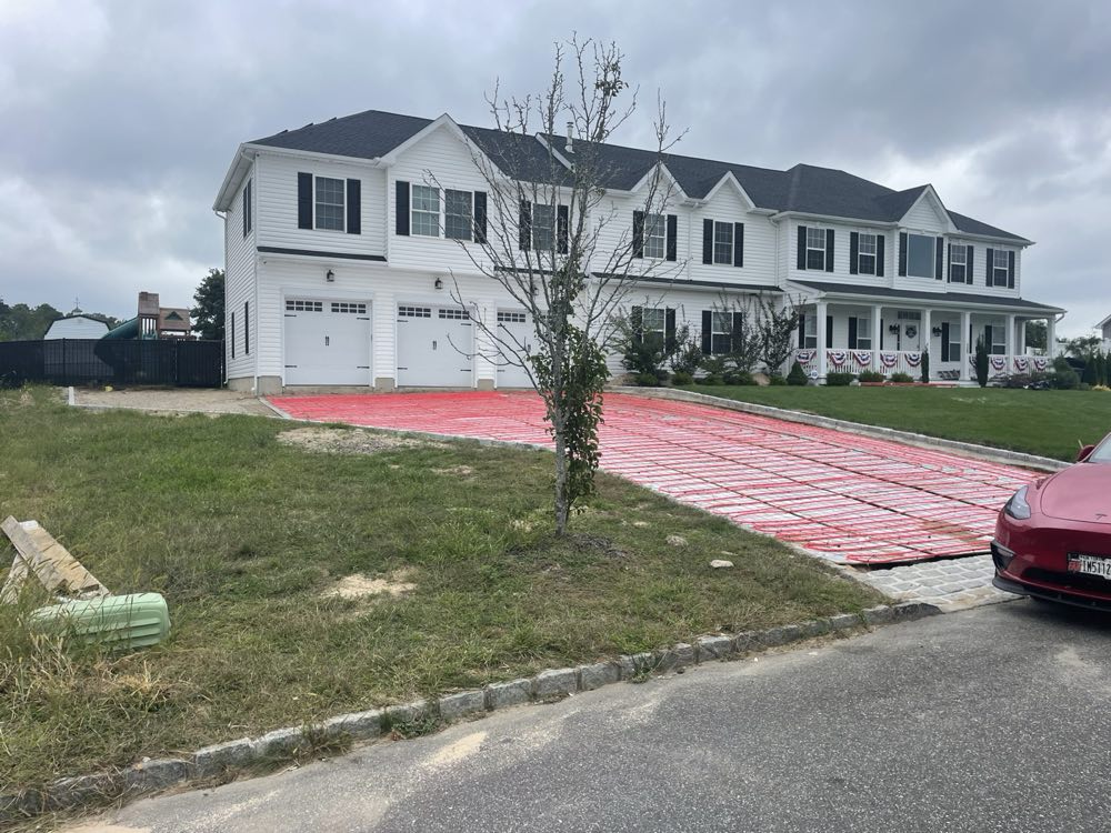 Newly poured concrete driveway at a residential townhouse development